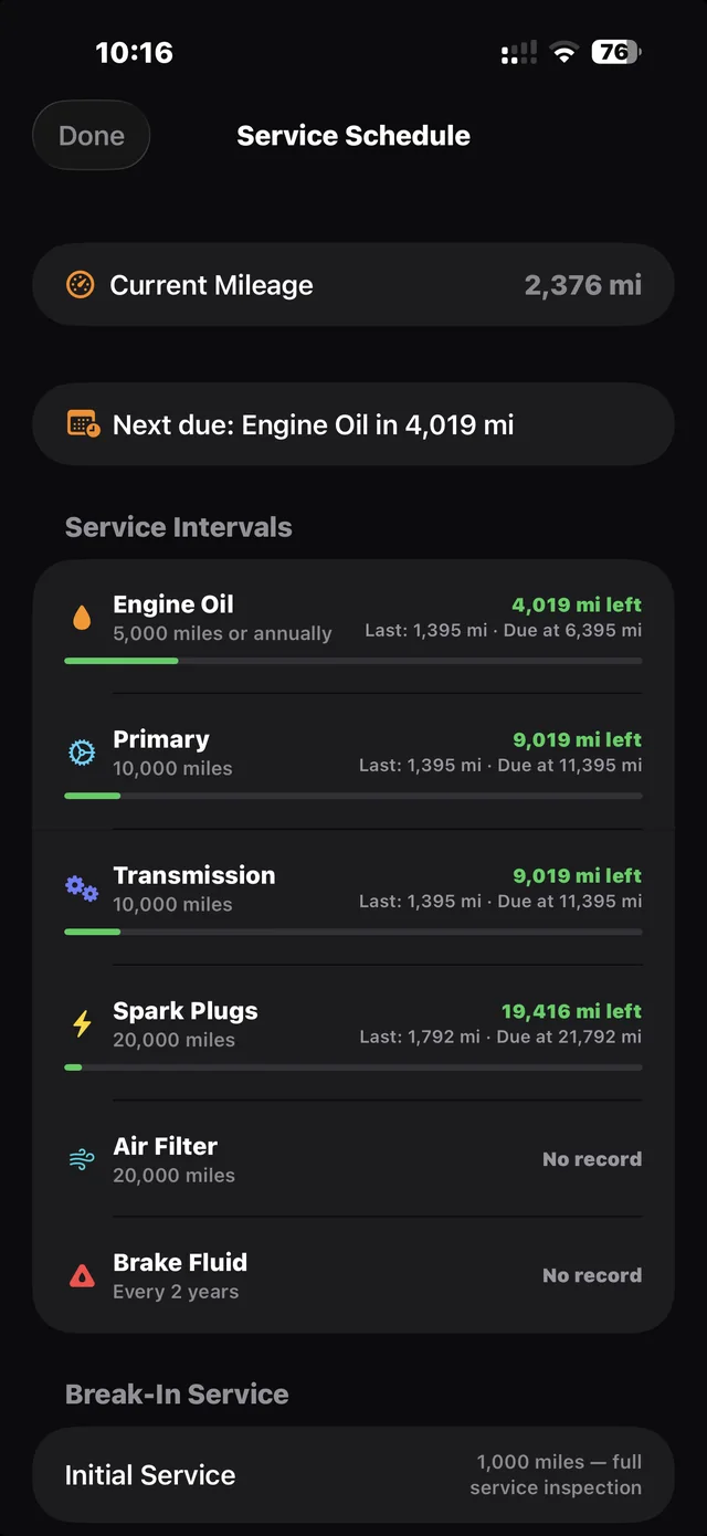 Service schedule: per-item intervals with miles remaining for oil, primary, transmission, plugs